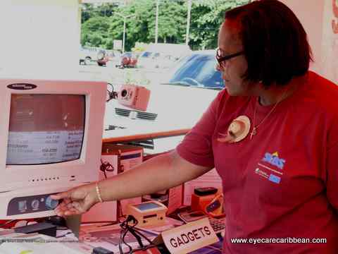 Mrs Emma Bernard Joseph showing the magnifying CCTV
